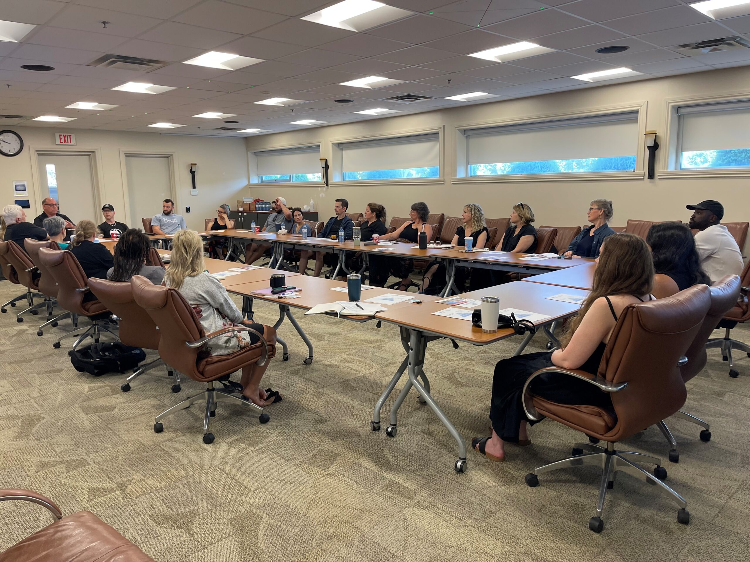 BECN clients gather in board room for Peer-to-Peer seminar