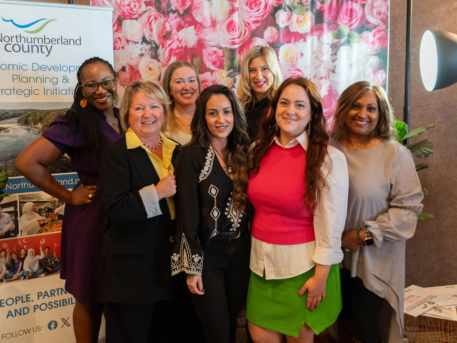 Photo of speakers at 2025 She Owns It Conference