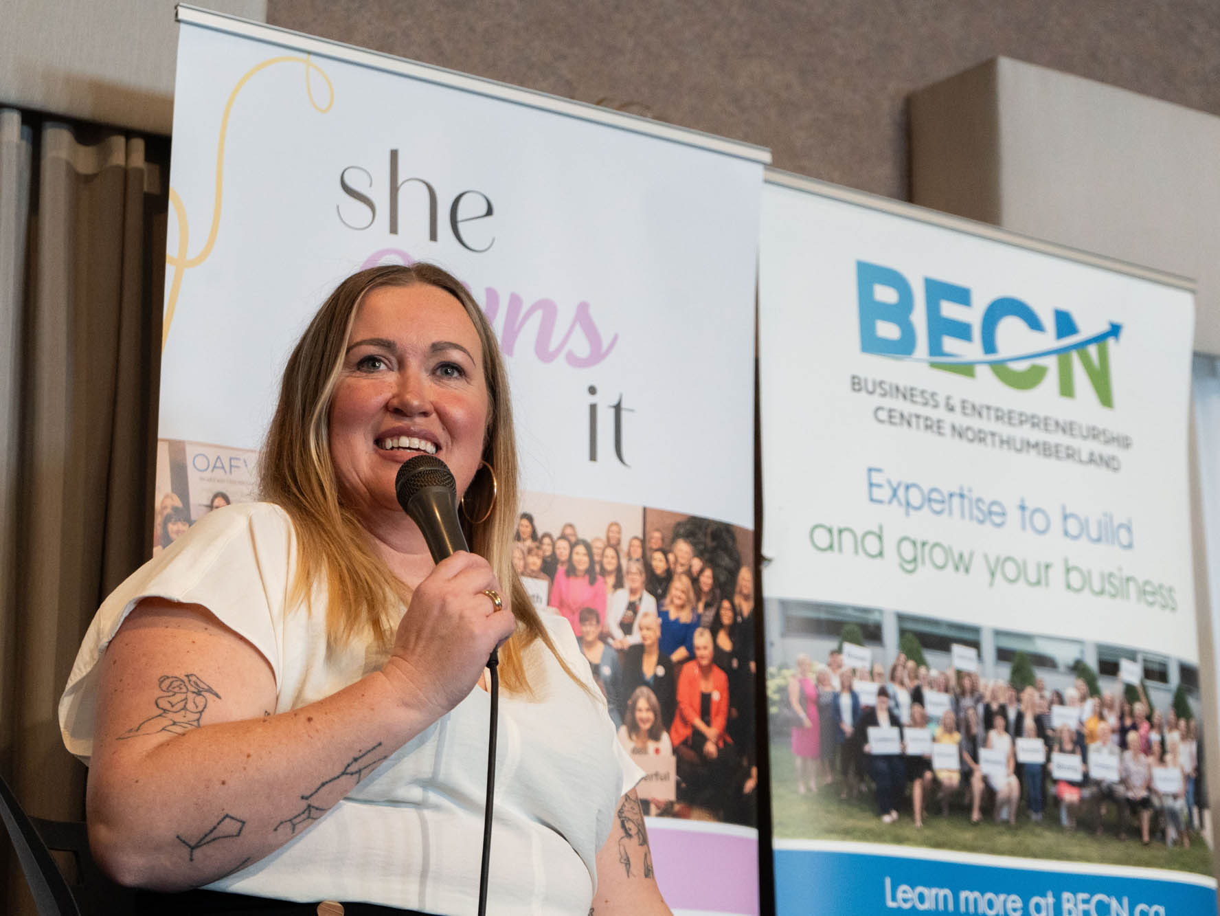 Photo of presenter at 2025 She Owns It Conference