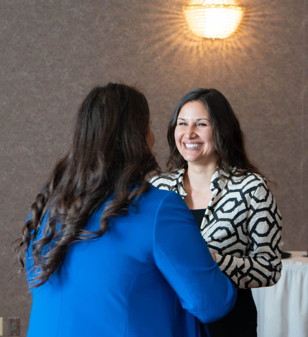 Photo of attendees at 2025 She Owns It Conference