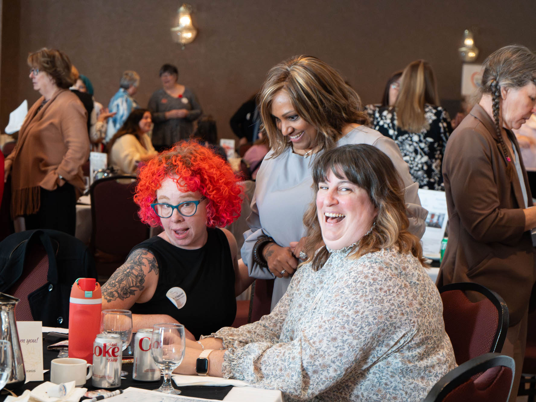 Photo of attendees at 2025 She Owns It Conference